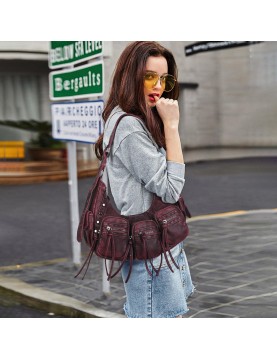 Vintage distressed tassel underarm bag