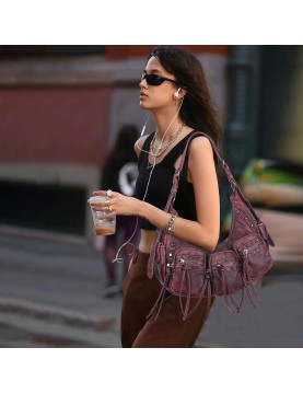 Vintage distressed tassel underarm bag